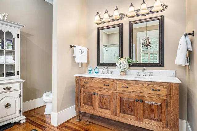 a view of walk in closet with clothes