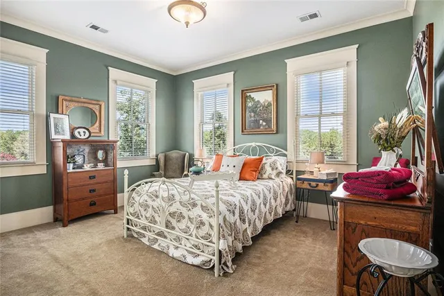 a view of a patio with a table chairs and a patio