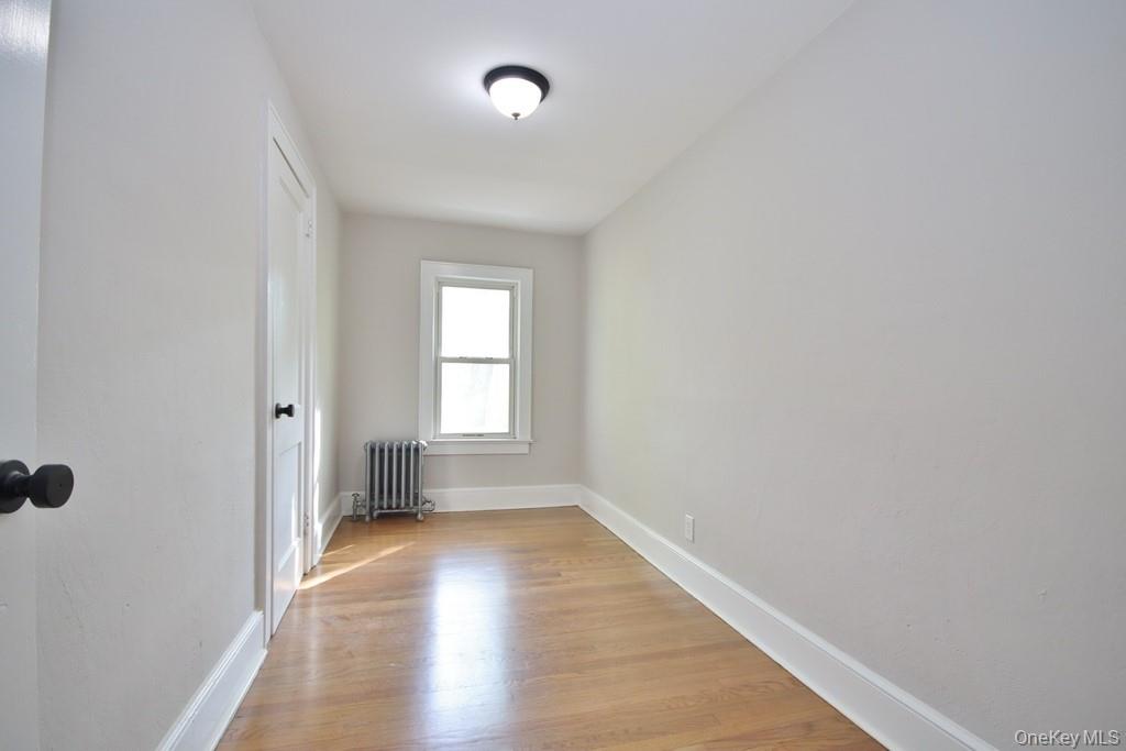 233 Haviland Drive Patterson, NY 12563 - Photo 15 of 19 Third Bedroom has hardwood floors and a closet