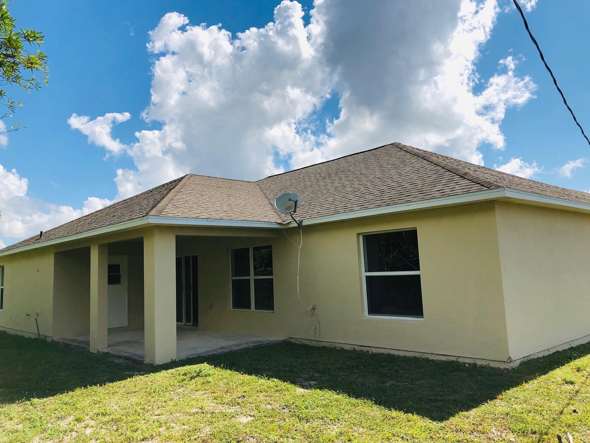 4550 Southwest Uleta Street Port St. Lucie, FL 34953 - Photo 25 of 27 Covered Porch