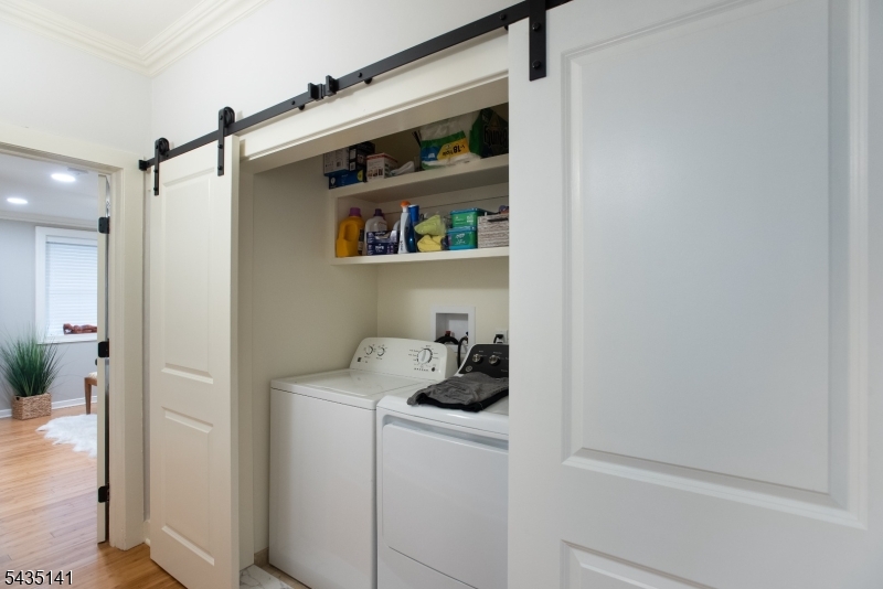 14 Locust Street Madison, NJ 07940 - Photo 18 of 33 a utility room with dryer and washer