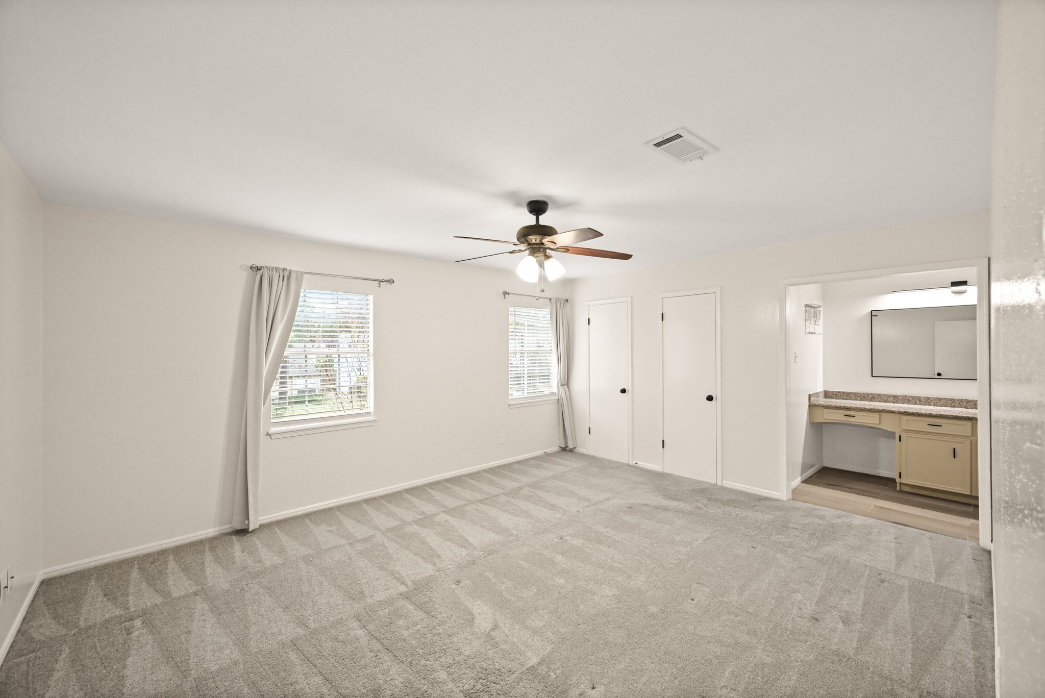 7618 Fountaingrove Lane Spring, TX 77379 - Photo 12 of 20 Large second-floor primary bedroom offering comfort, privacy, and plenty of space for a full furniture setup.