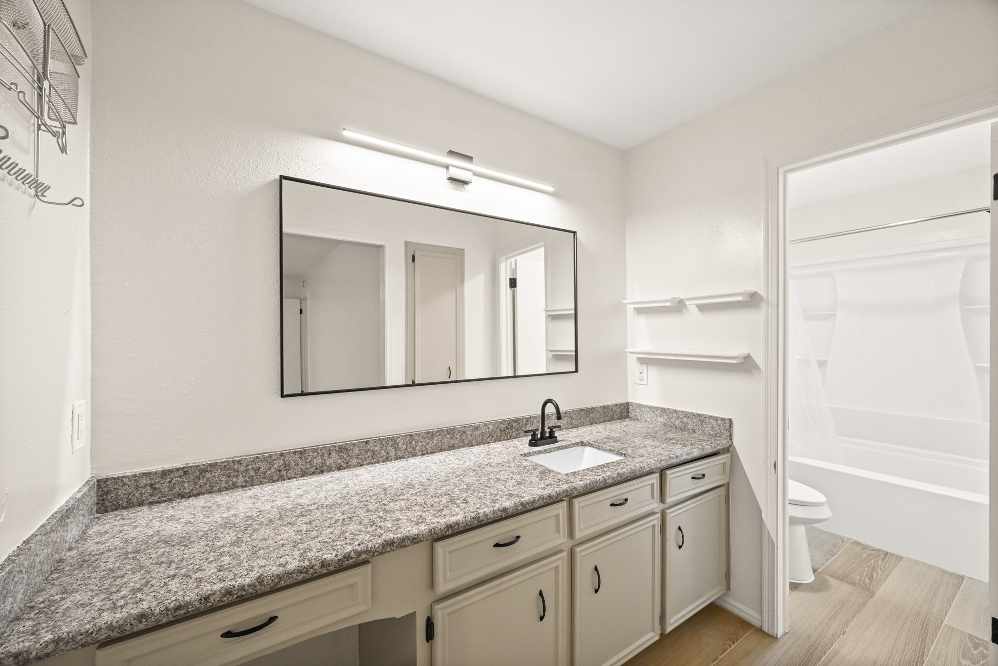 7618 Fountaingrove Lane Spring, TX 77379 - Photo 13 of 20 Primary bathroom with ample storage, great lighting, and direct access to the private shower room.