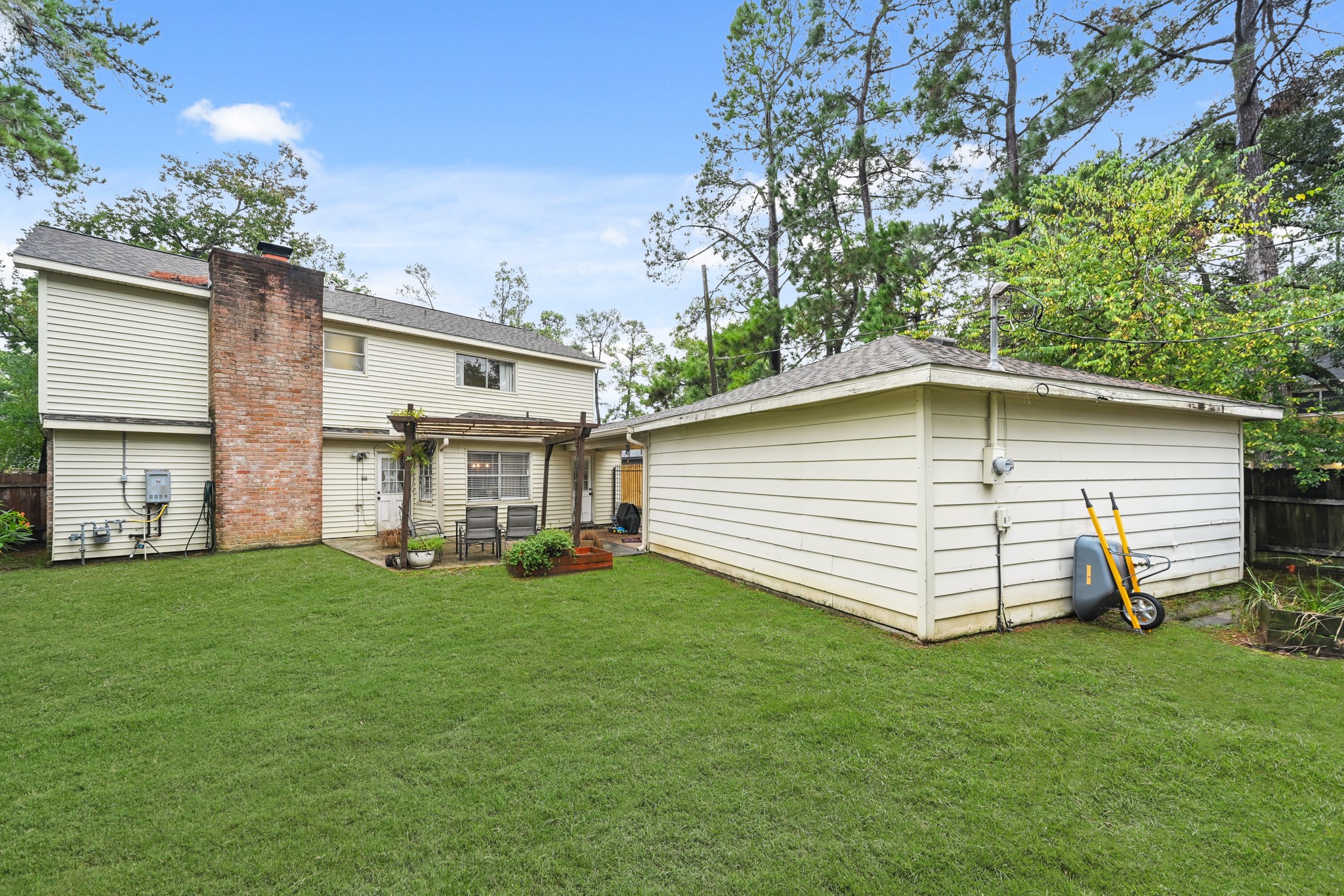 7618 Fountaingrove Lane Spring, TX 77379 - Photo 19 of 20 Expansive backyard perfect for outdoor entertaining, gardening, pets, or children’s activities with room to play.Plenty of yard space to create your ideal outdoor retreat, from grilling to evening relaxation.