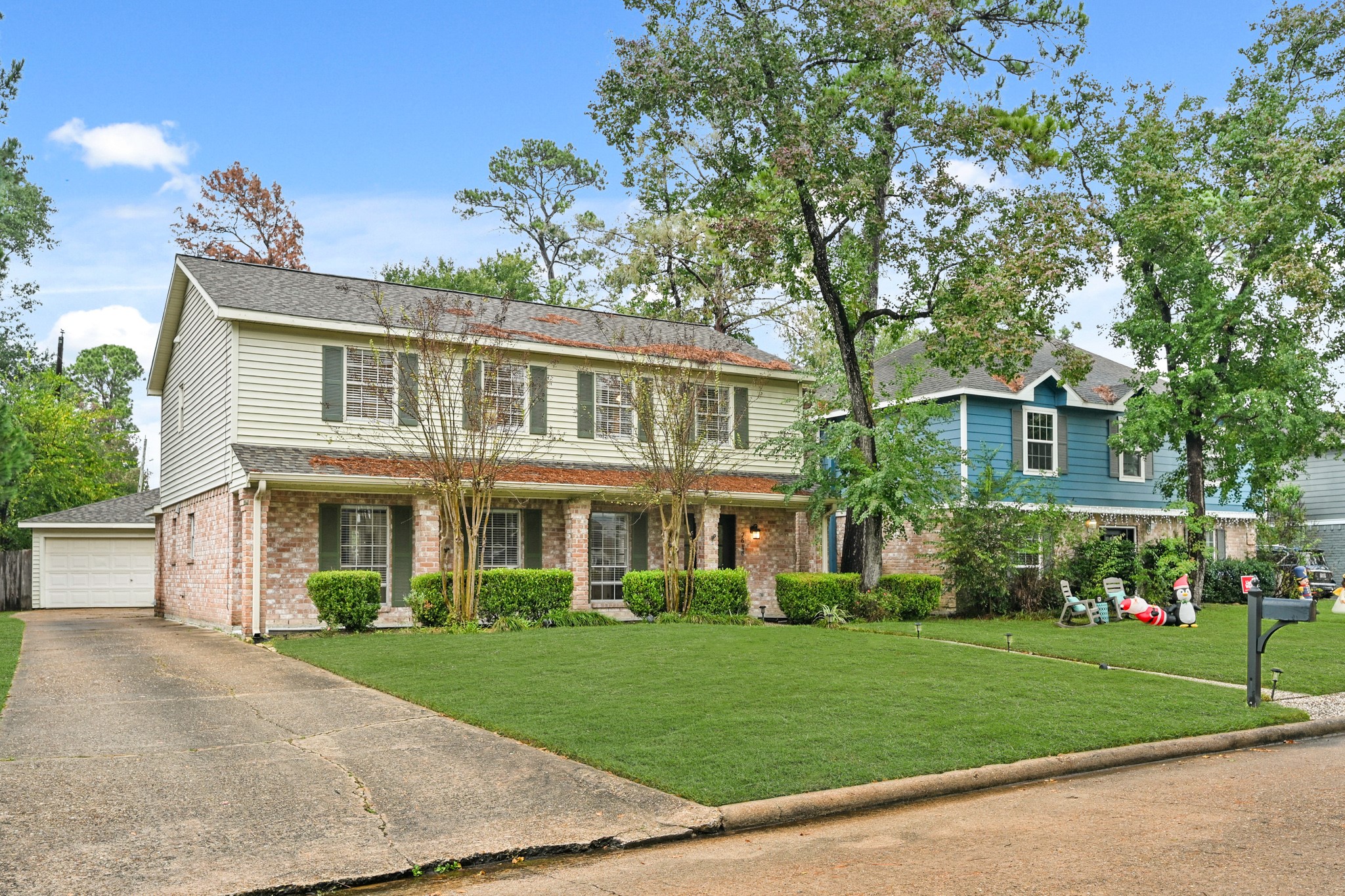 7618 Fountaingrove Lane Spring, TX 77379 - Photo 2 of 20 Long private driveway leading to a detached two-car garage on an oversized lot, offering ample parking and great curb appeal.
