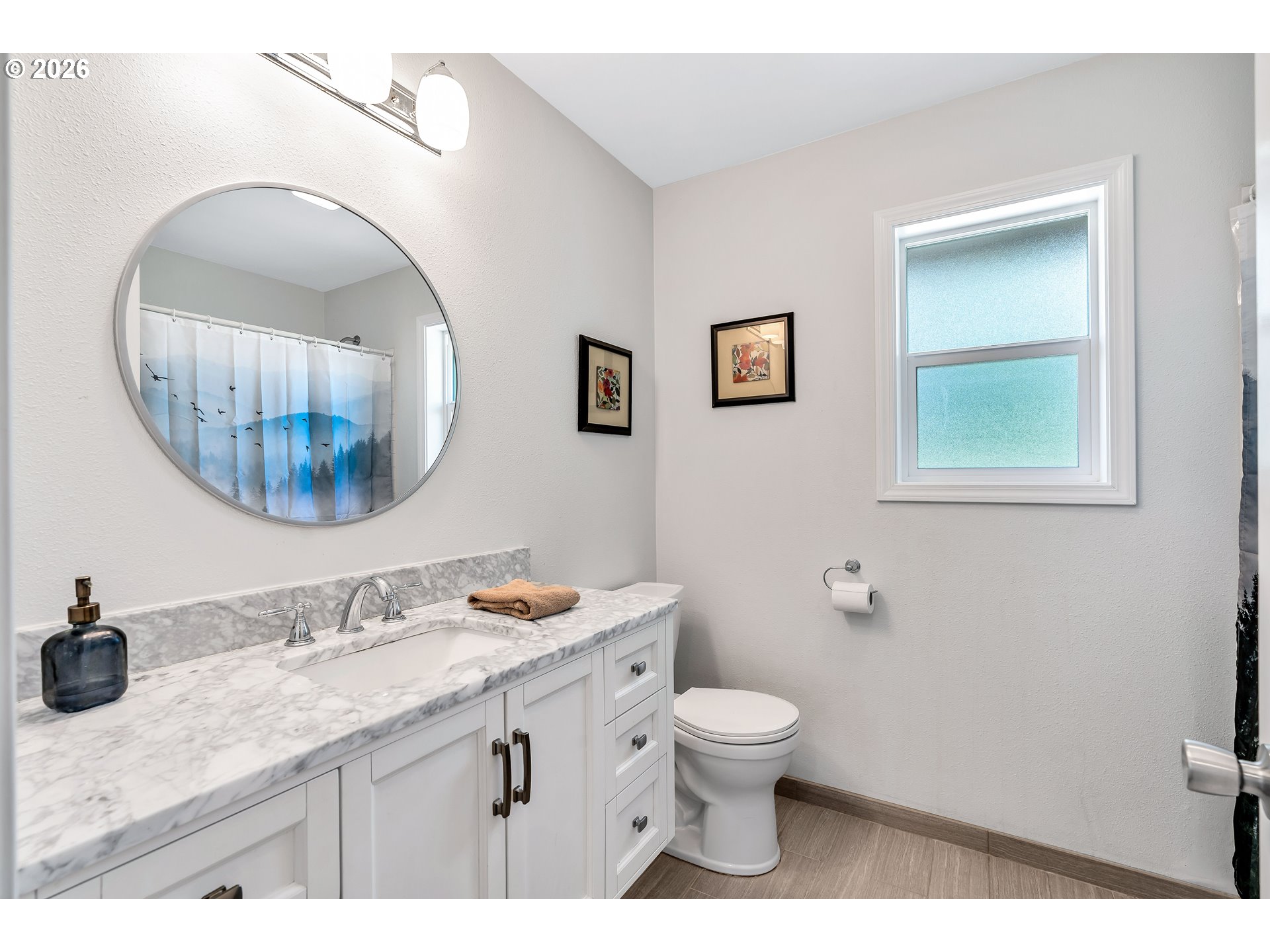12313 South Groshong Road Molalla, OR 97038 - Photo 29 of 48 a bathroom with a granite countertop toilet a sink and mirror