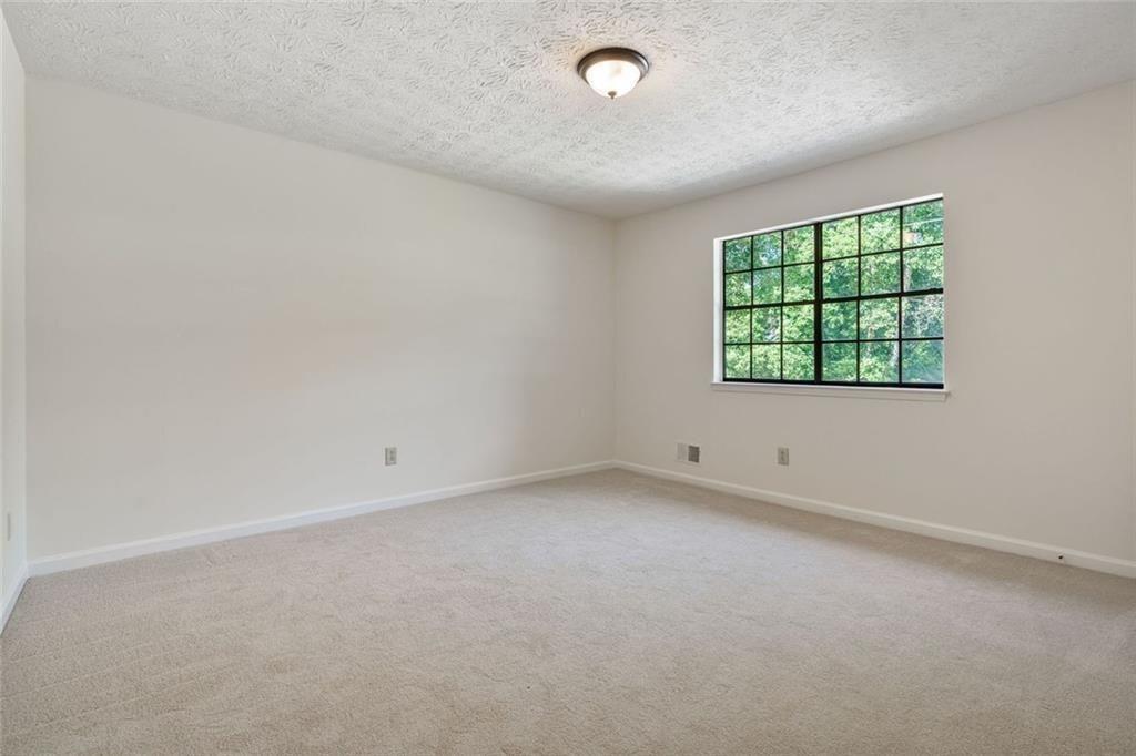 4534 Tifton Court Powder Springs, GA 30127 - Photo 16 of 23 an empty room with a window