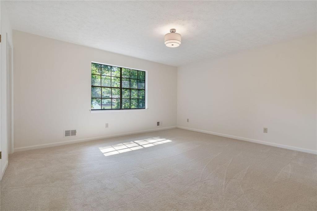 4534 Tifton Court Powder Springs, GA 30127 - Photo 17 of 23 an empty room with a window