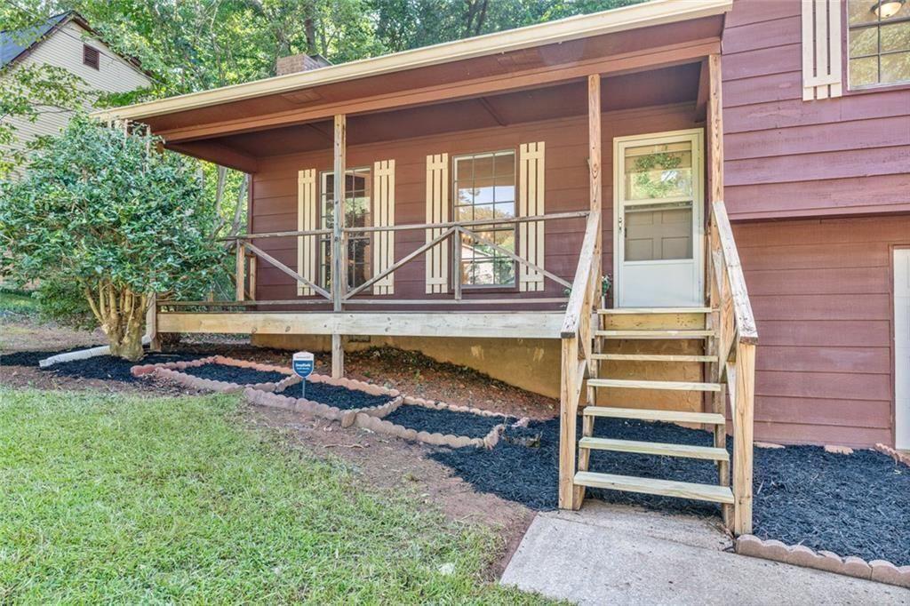 4534 Tifton Court Powder Springs, GA 30127 - Photo 2 of 23 front view of house with a yard