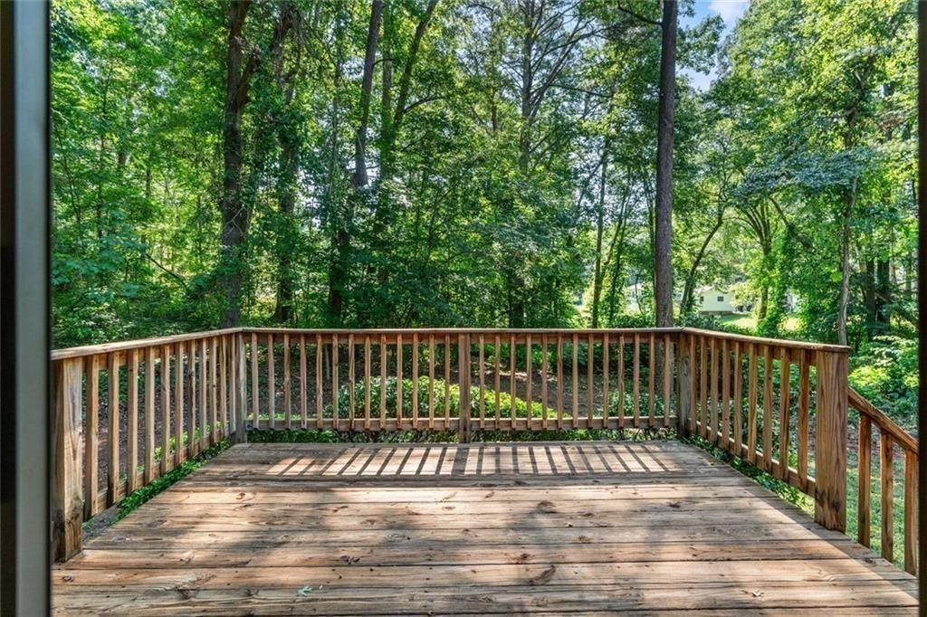 4534 Tifton Court Powder Springs, GA 30127 - Photo 5 of 23 a view of balcony with wooden floor