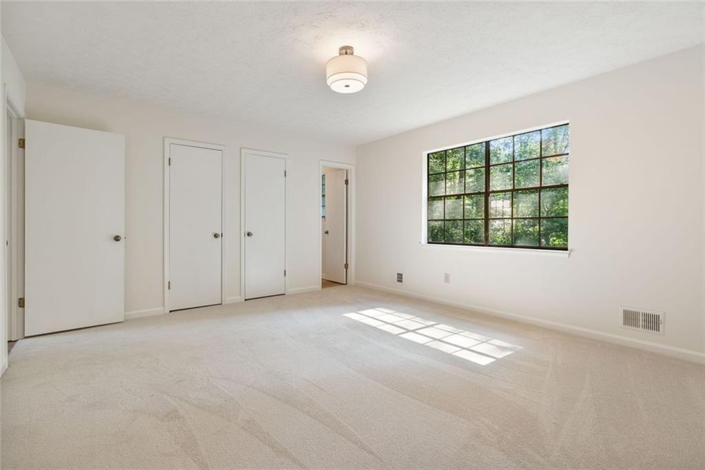 4534 Tifton Court Powder Springs, GA 30127 - Photo 6 of 23 an empty room with windows