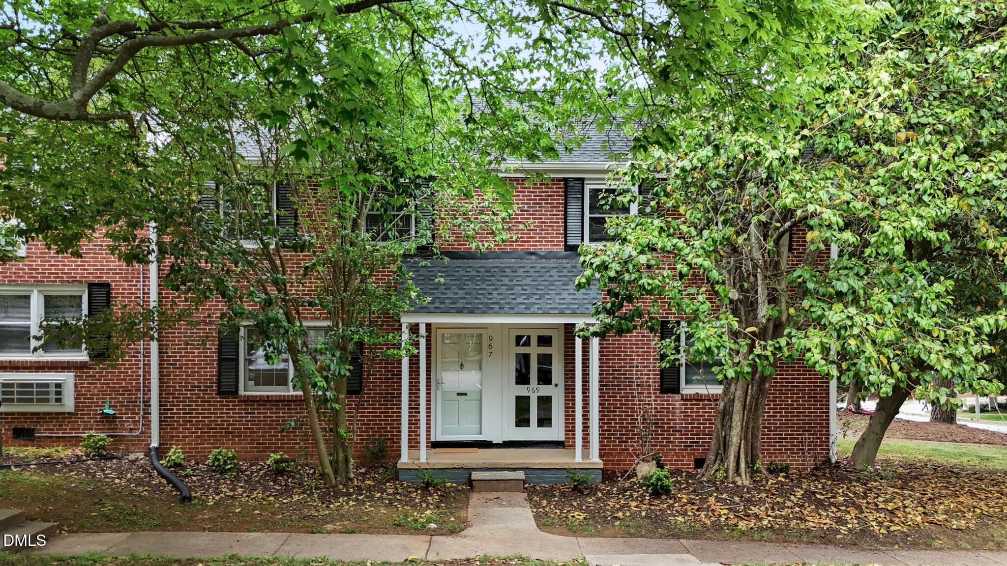 967 St Marys Street Raleigh, NC 27605 - Photo 2 of 34 a front view of a house with garden