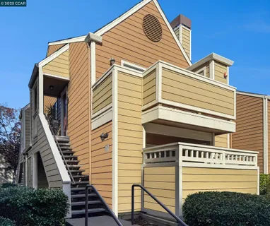 a front view of a house with a garage
