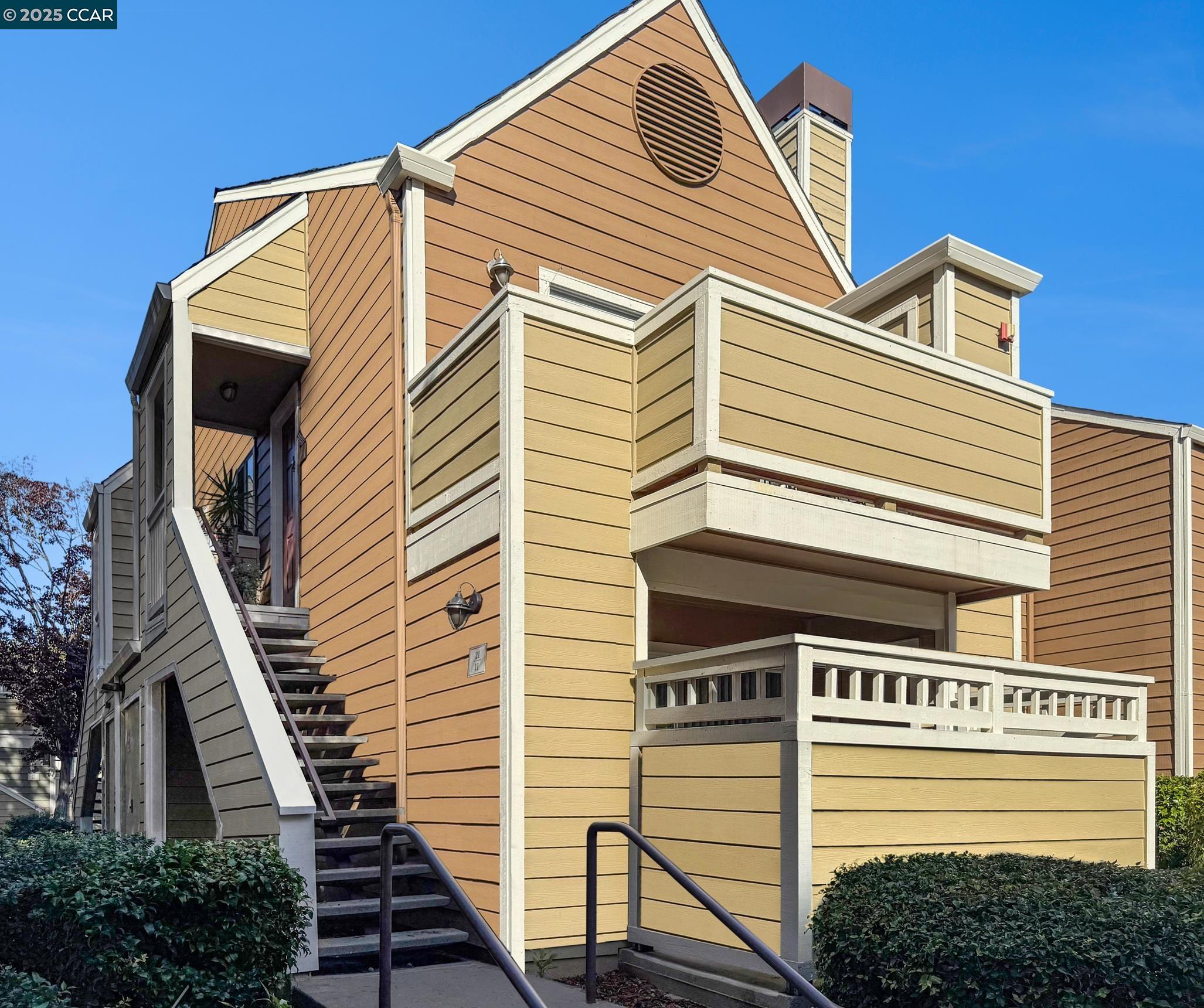 a front view of a house with a garage