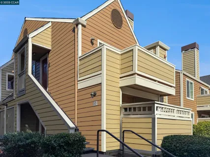 a view of a house with a street