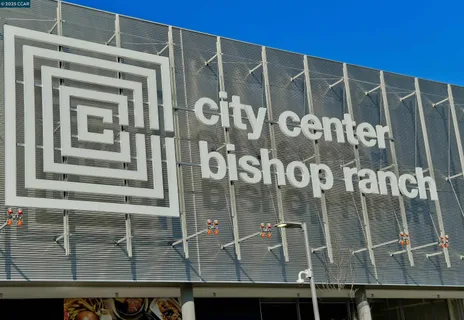 a view of a chairs and table in a patio
