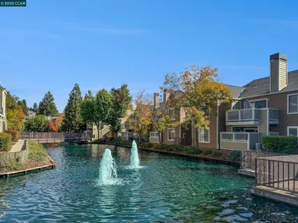 a view of a lake with a yard