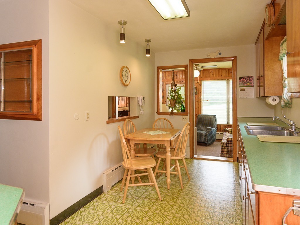 107 Mine Brook Road Webster, MA 01570 - Photo 14 of 30 a dining room with furniture and a window