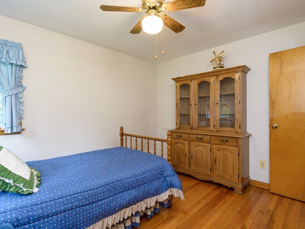 107 Mine Brook Road Webster, MA 01570 - Photo 21 of 30 a bedroom with bed and wooden floor