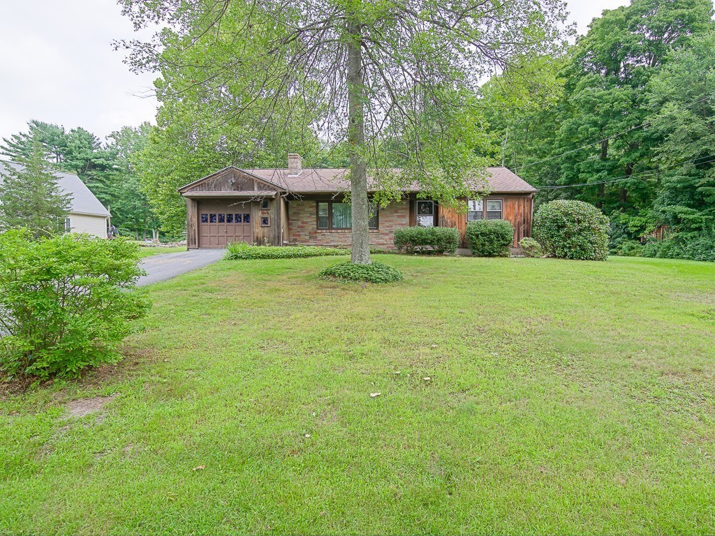 107 Mine Brook Road Webster, MA 01570 - Photo 27 of 30 a front view of a house with a garden