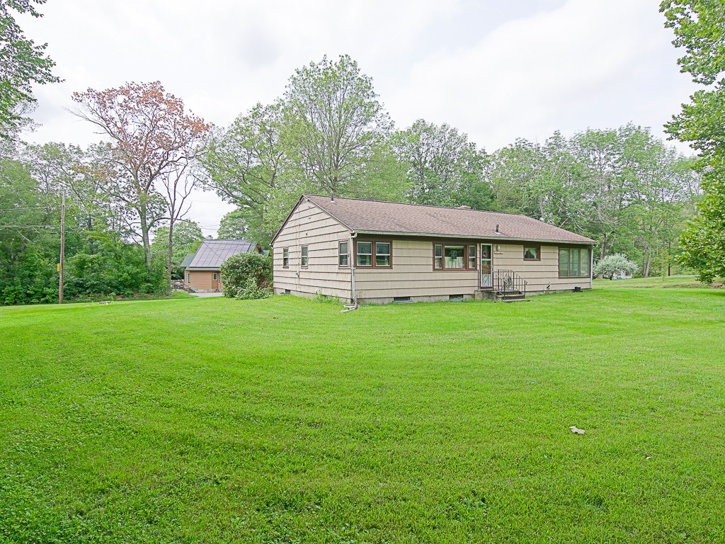 107 Mine Brook Road Webster, MA 01570 - Photo 29 of 30 a view of a house with a yard