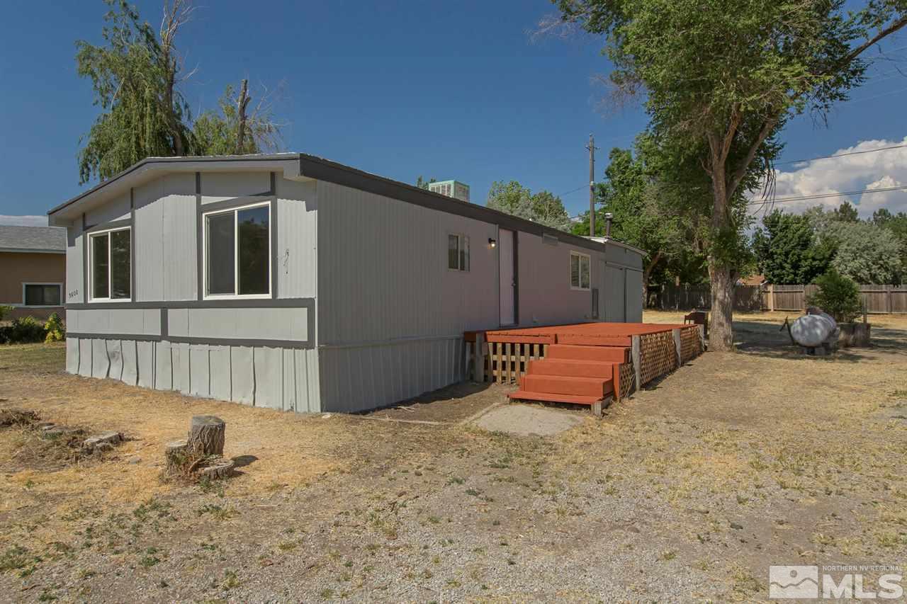 3600 Hummingbird Drive Reno, NV 89508 - Photo 1 of 1 a view of a small house with wooden fence