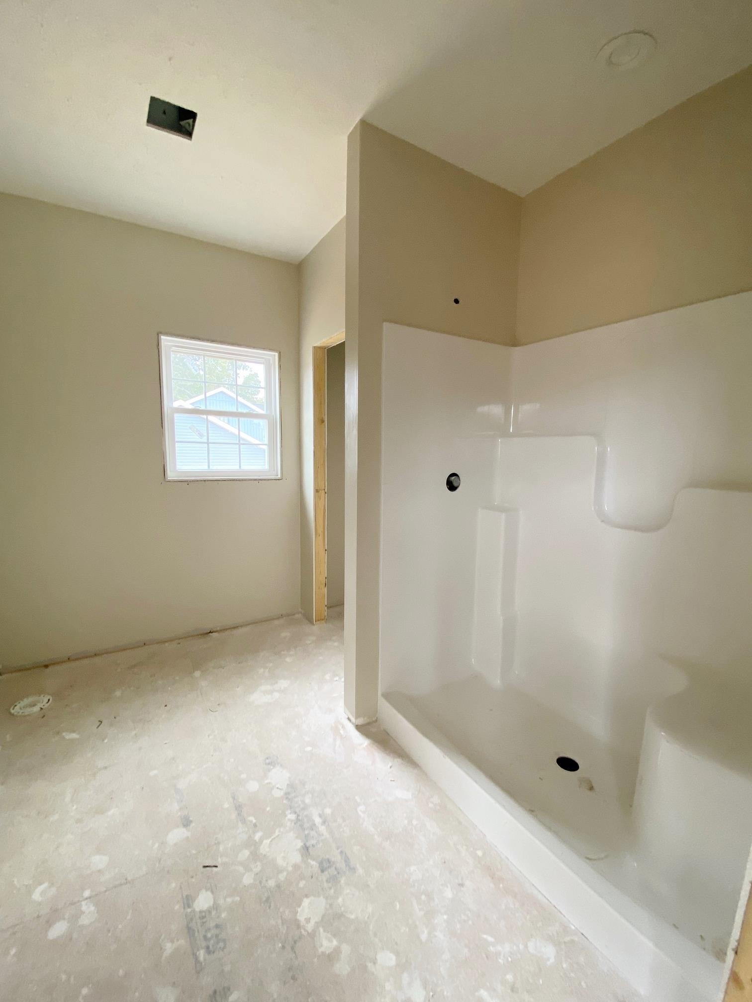 122 Spring Ridge Drive Stuarts Draft, VA 24477 - Photo 11 of 16 a view of an empty room with a bathroom