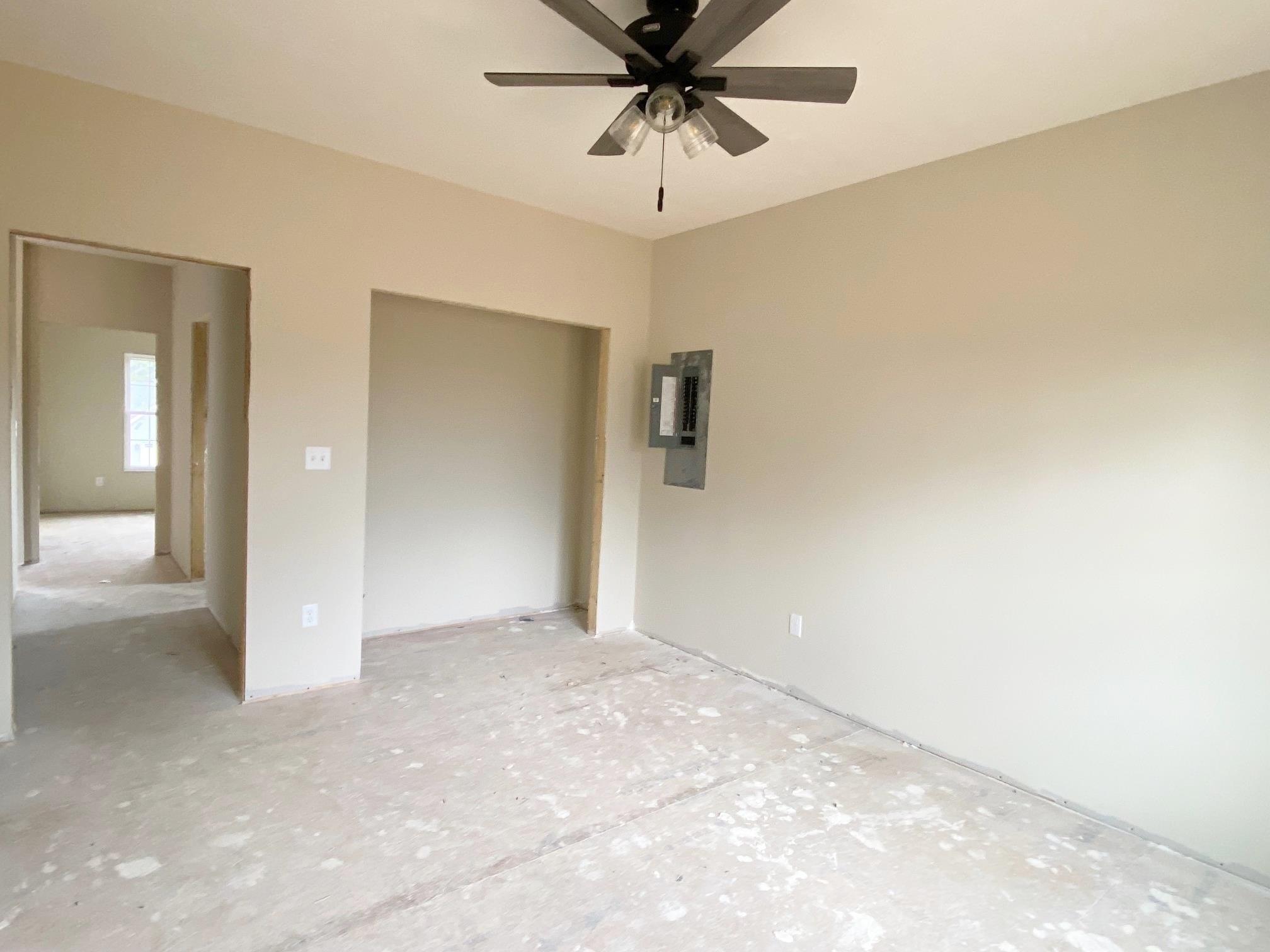 122 Spring Ridge Drive Stuarts Draft, VA 24477 - Photo 16 of 16 a view of a hallway with a chandelier fan