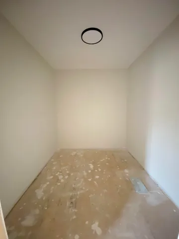 a view of a room with rack on the wall