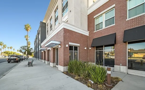 a building with trees in front of it