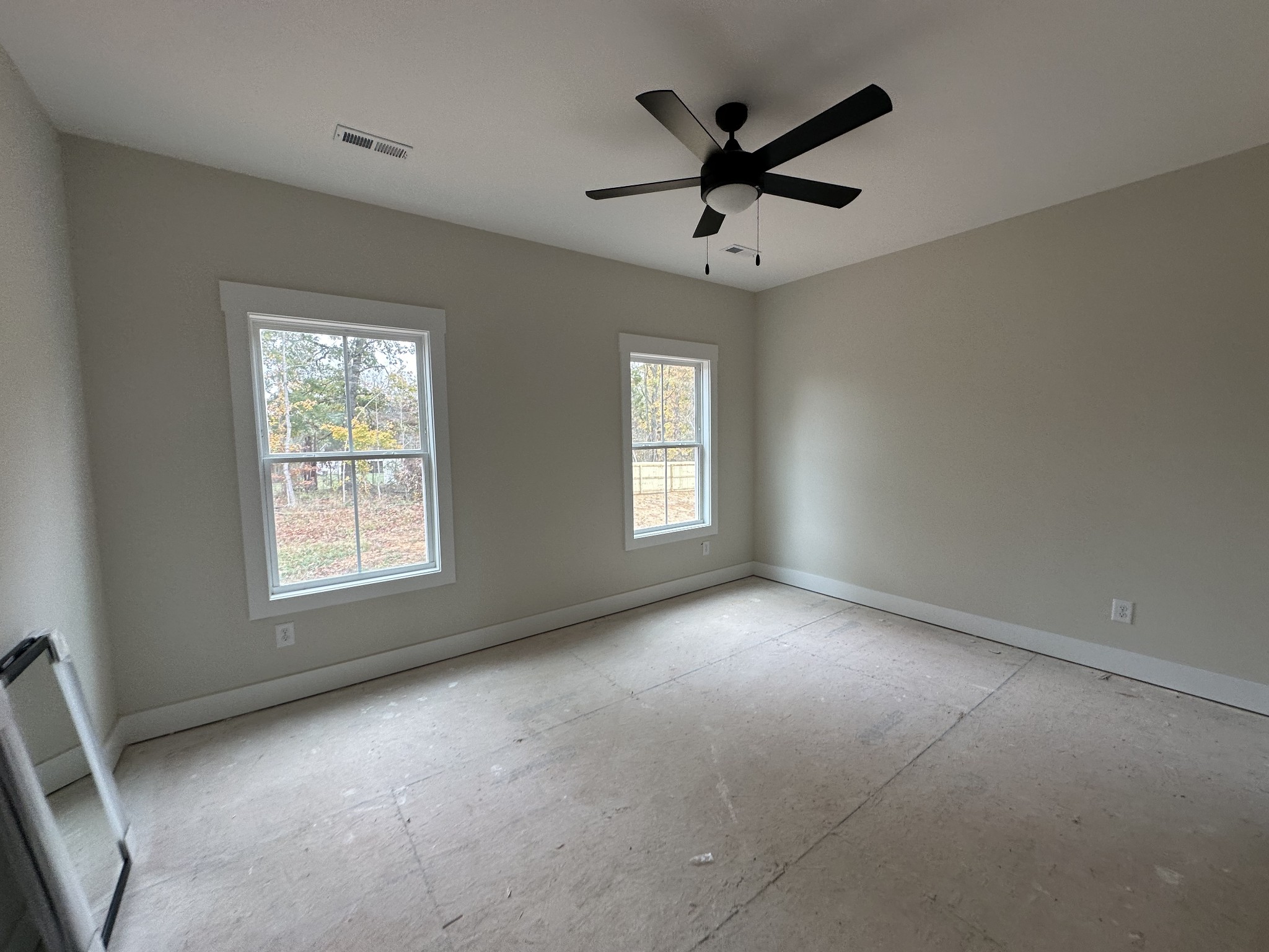 233 Wayne Hall Road Clarksville, TN 37040 - Photo 12 of 14 a view of a livingroom with a ceiling fan and window
