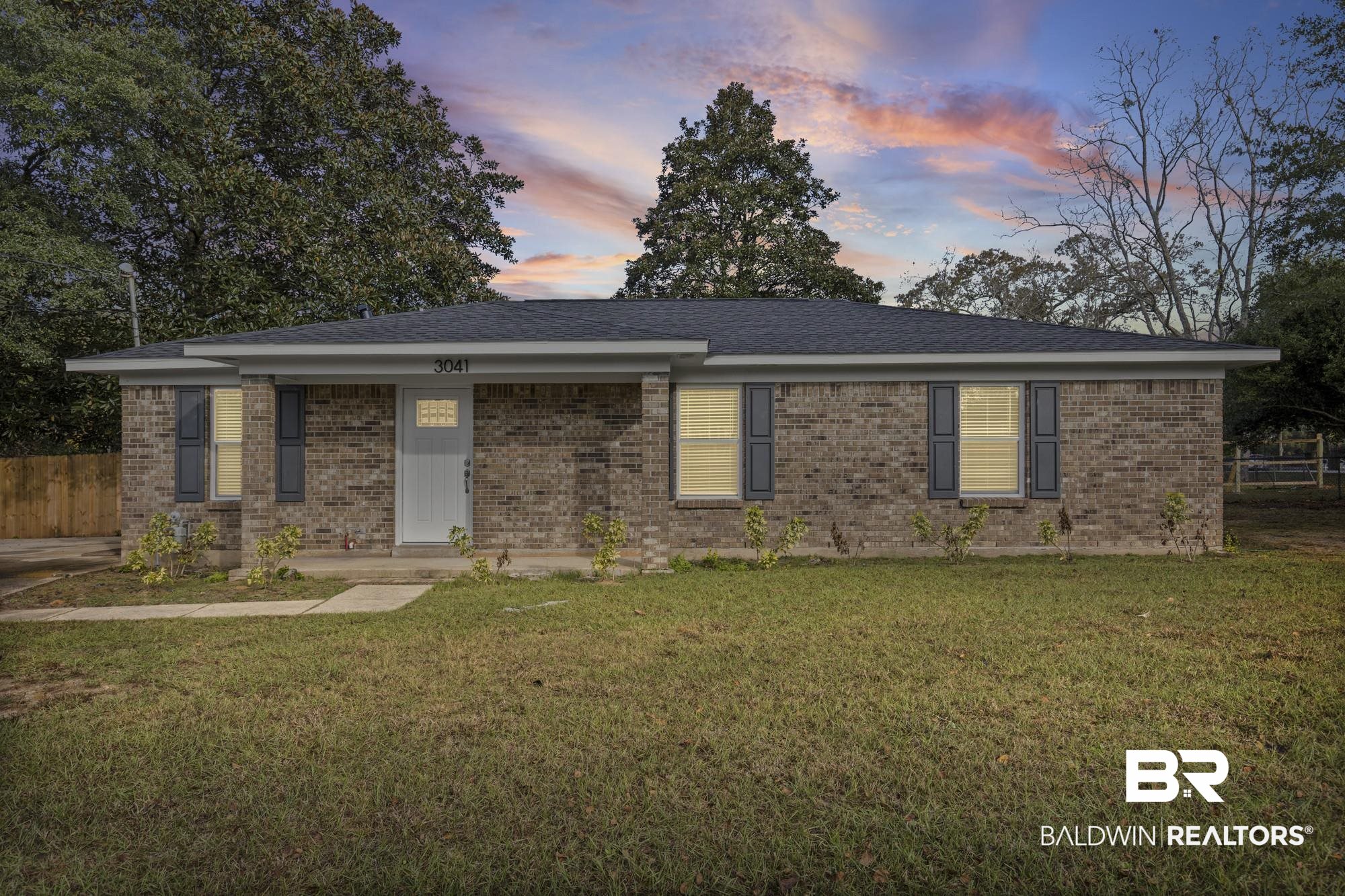3041 Pretty Branch Drive East Mobile, AL 36618 - Photo 1 of 20 Ranch-style house with brick siding and a shingled roof