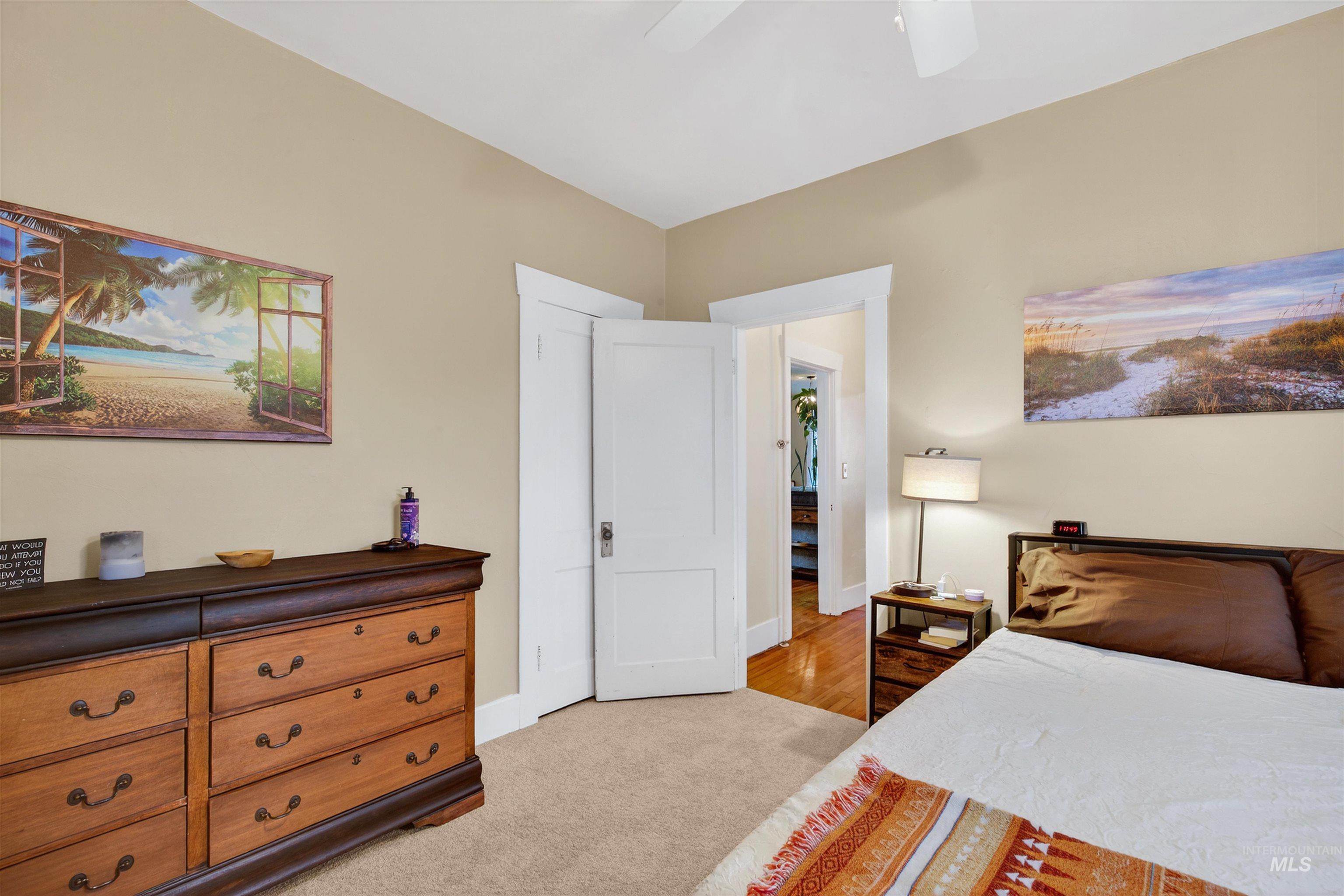 1021 11th Avenue Lewiston, ID 83501 - Photo 16 of 41 Bedroom with light carpet and ceiling fan