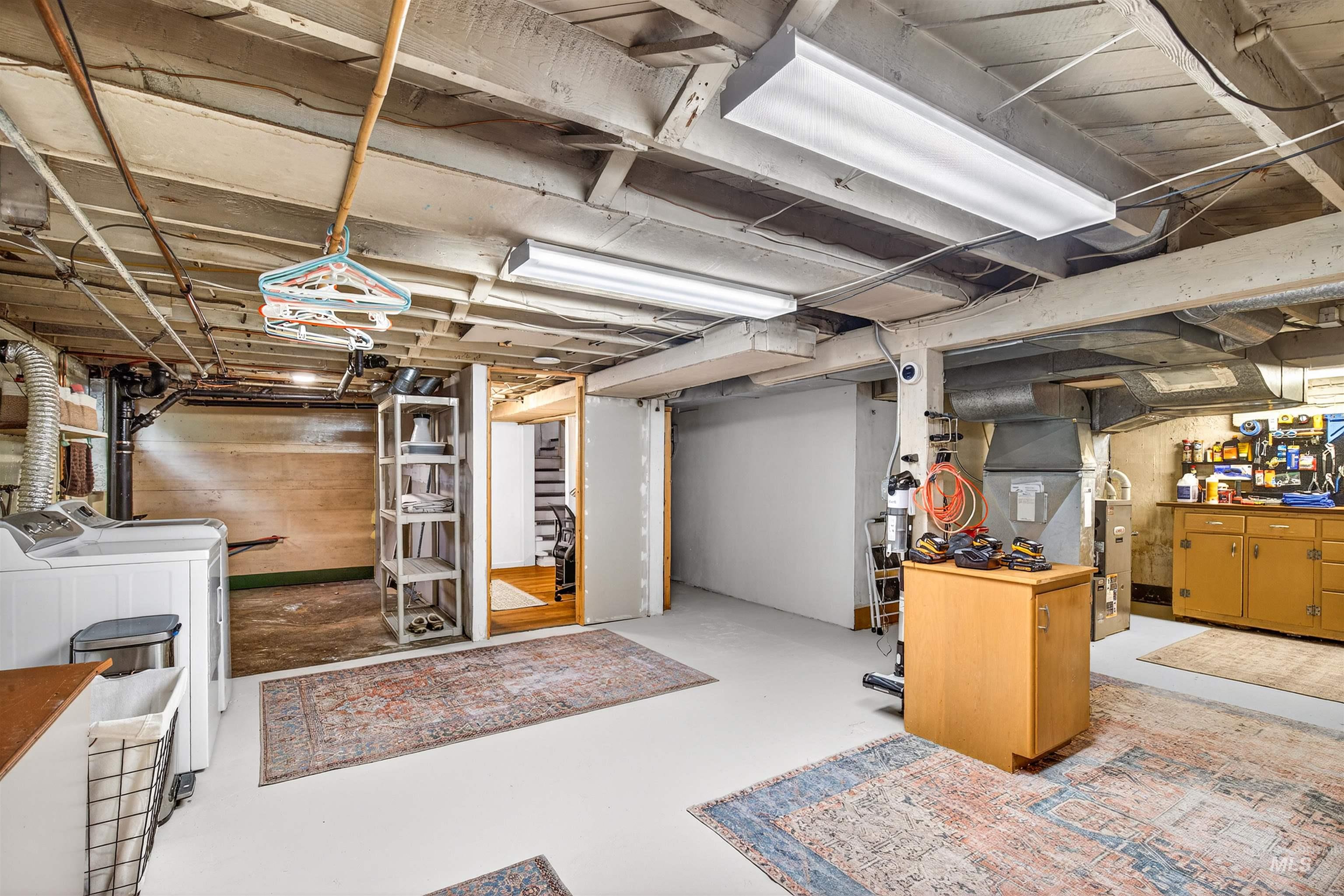 1021 11th Avenue Lewiston, ID 83501 - Photo 27 of 41 Unfinished below grade area with washing machine and dryer