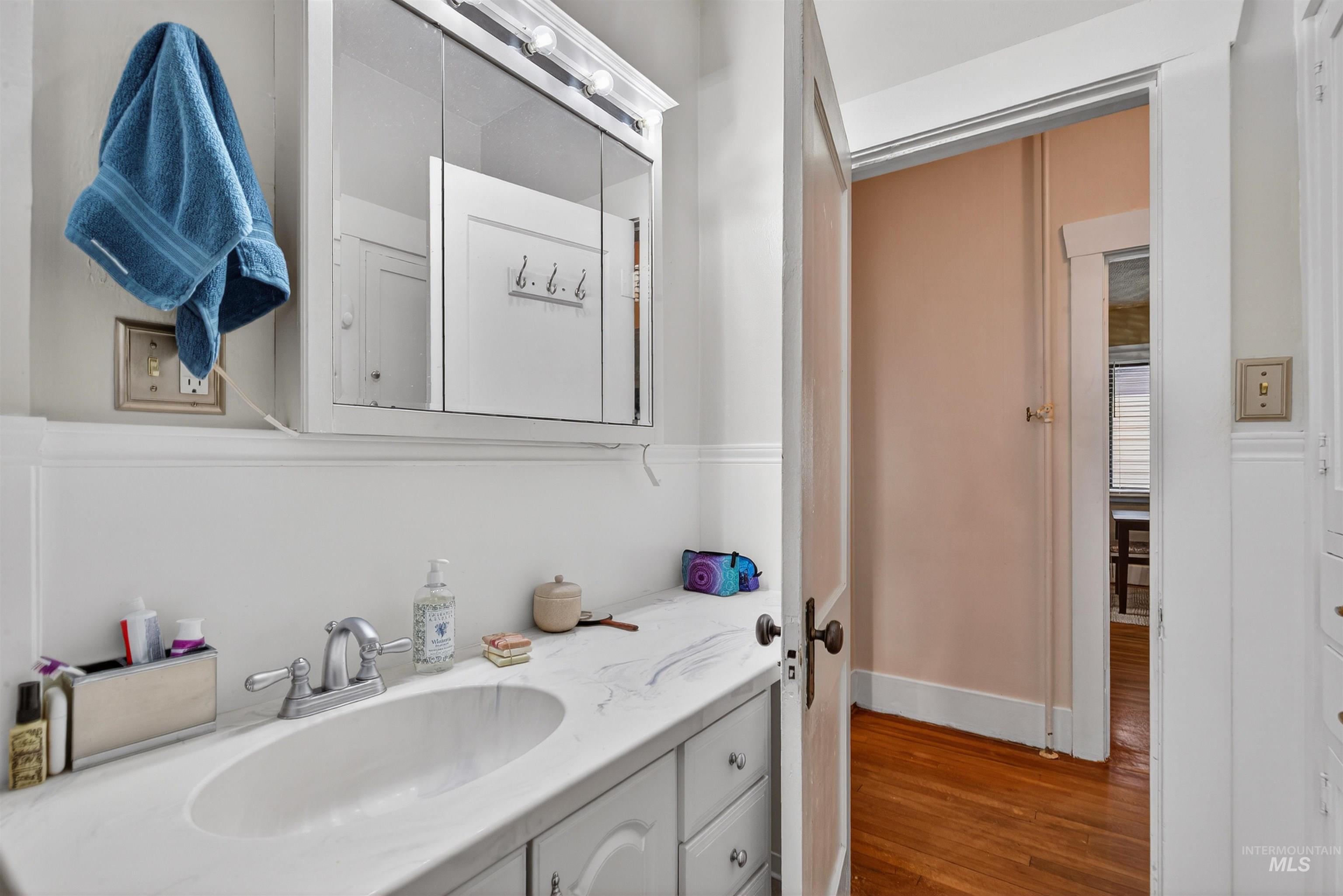 1021 11th Avenue Lewiston, ID 83501 - Photo 30 of 41 Bathroom with vanity and dark wood finished floors