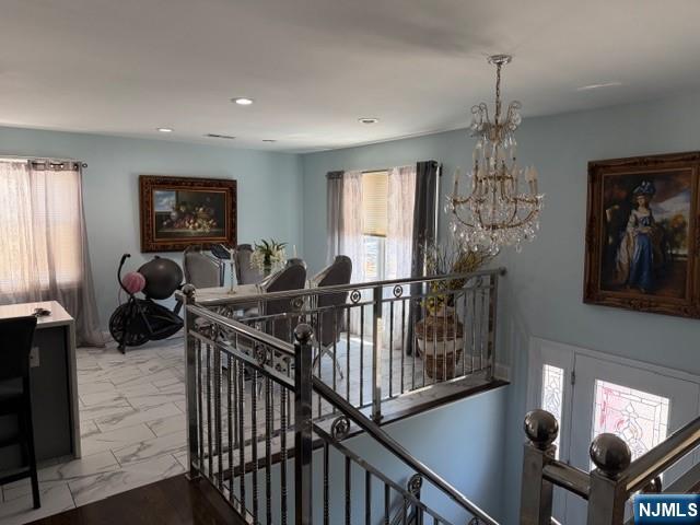 177 Maple Street Fairview, NJ 07022 - Photo 13 of 24 a view of a livingroom with furniture and hardwood floor