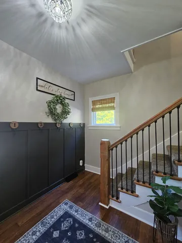 a view of entryway with wooden floor