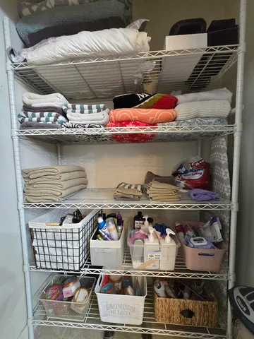 a bathroom with a toilet a sink and a mirror