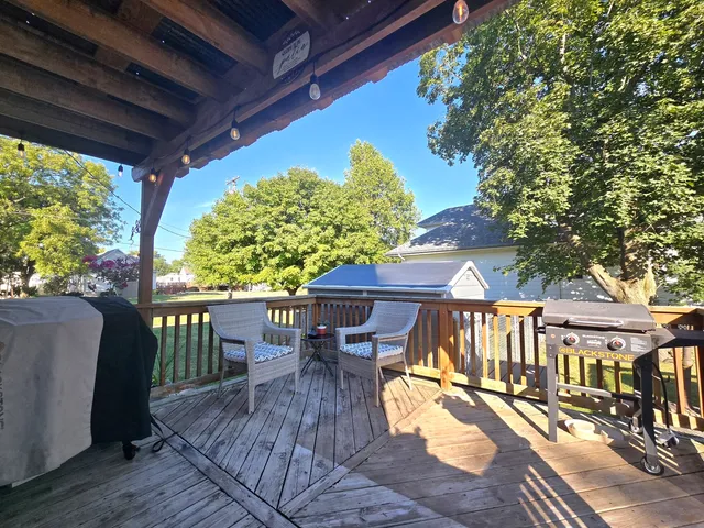 a view of a balcony with chairs