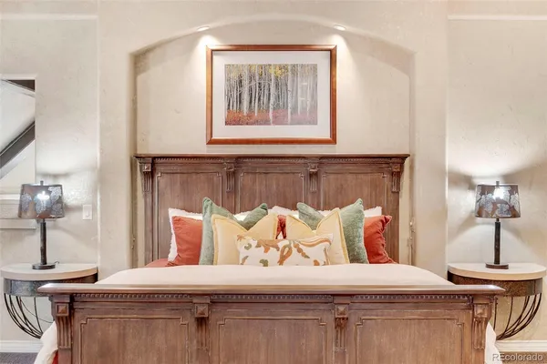 a bed room with a bed and a large window