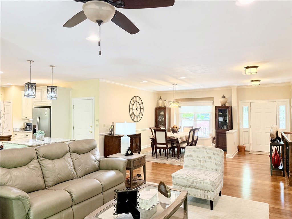 10 Captain Lane Salem, SC 29676 - Photo 28 of 28 This inviting interior features an open floorplan with hardwood flooring, creating a seamless flow between living spaces.