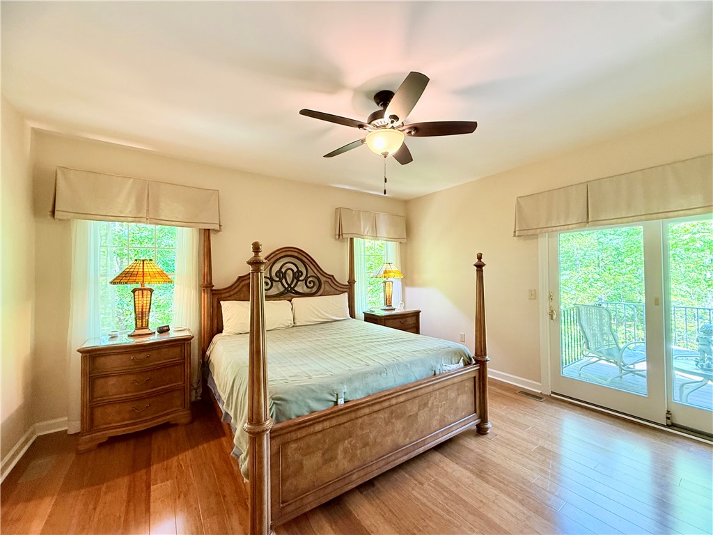 10 Captain Lane Salem, SC 29676 - Photo 13 of 28 This private master bedroom offers large walk-in closet, newly renovated master bath, and convenient access to private patio to enjoy the outdoors.
