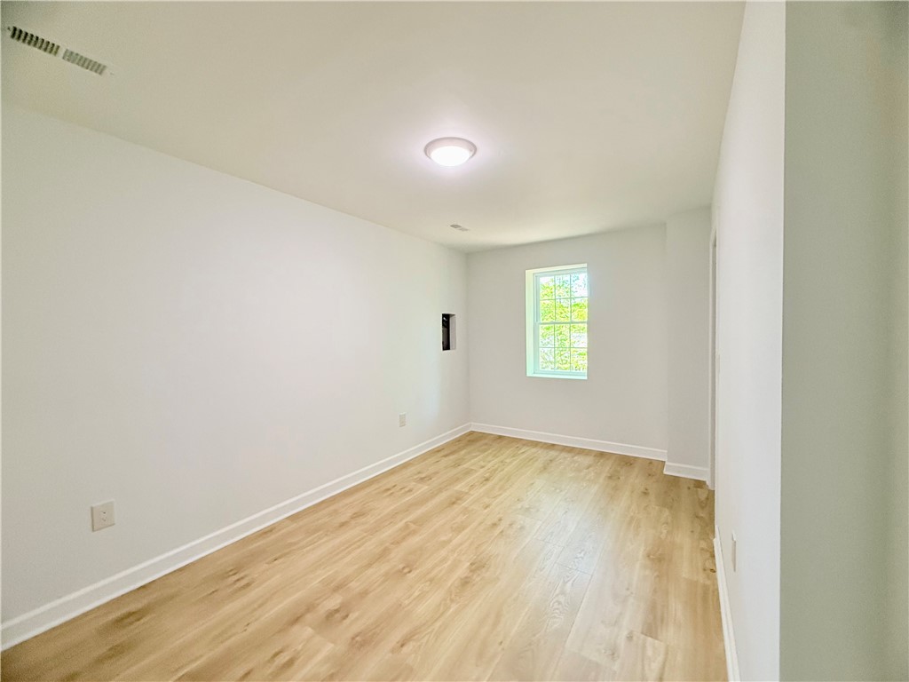 10 Captain Lane Salem, SC 29676 - Photo 23 of 28 This spacious lower level guest bedroom with walk-in closet could also be used as a work-out room or craft room.