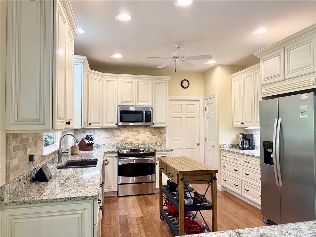 10 Captain Lane Salem, SC 29676 - Photo 3 of 28 This spacious kitchen features ample cabinetry and a functional layout, perfect for daily living.