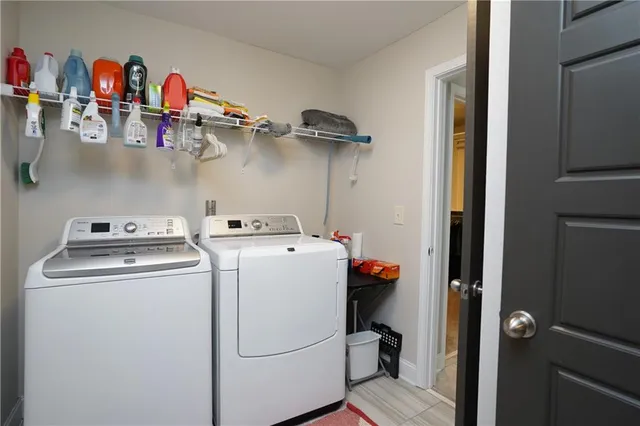 a utility room with dryer and washer