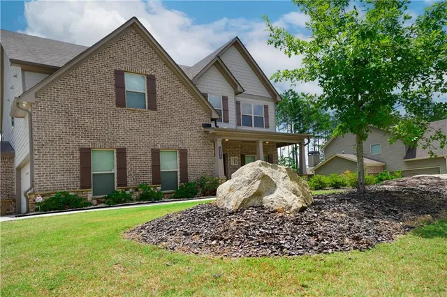 a house view with a garden space