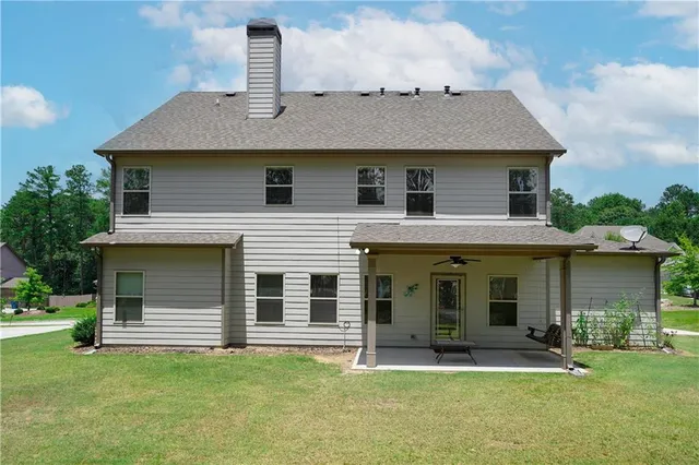 a view of a park with large trees