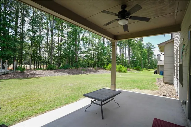 a view of a living room and a wooden floor