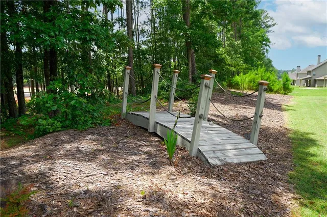 a couple of potted plants in front of door