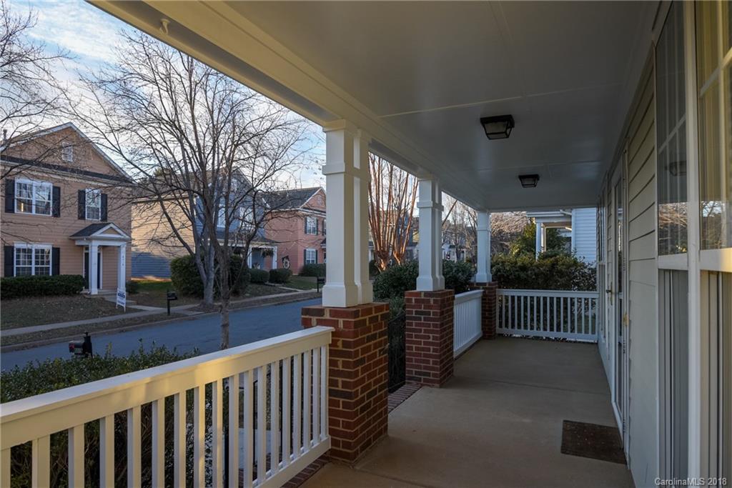 8319 Townley Road Huntersville, NC 28078 - Photo 2 of 17 a view of a porch with wooden fence and floor